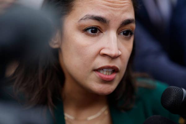 aoc close up interview green blazer.jpg