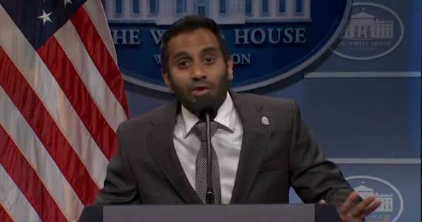 aziz ansari white house press briefing podium.jpg
