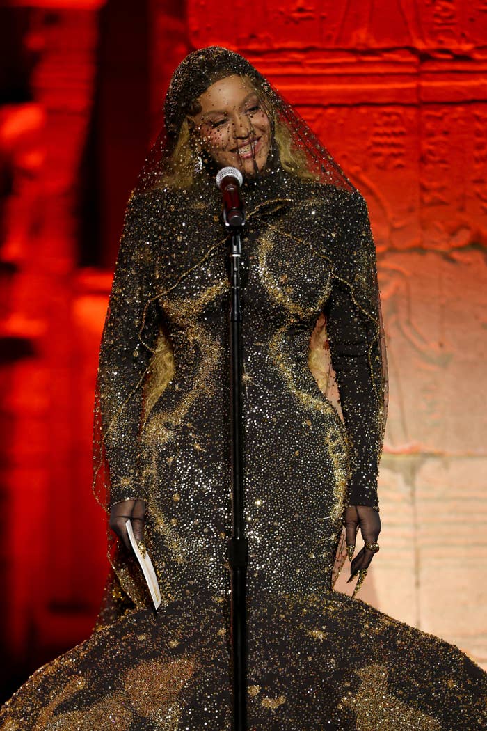beyonce gold sequin gown veil performance