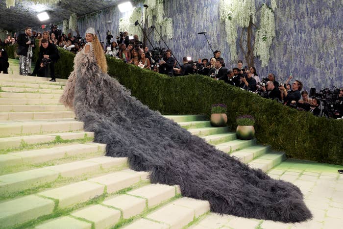 beyonce long grey feather train met gala
