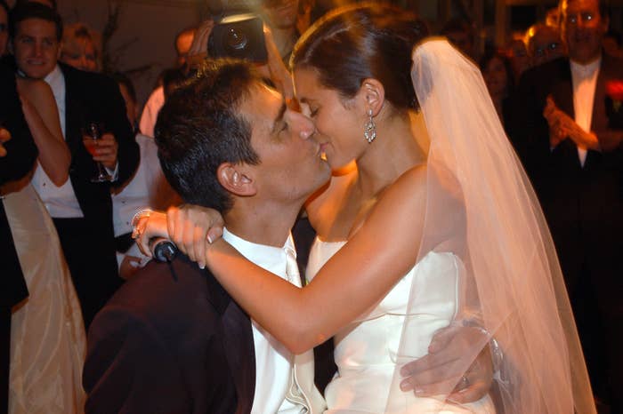 bride and groom kissing at wedding reception