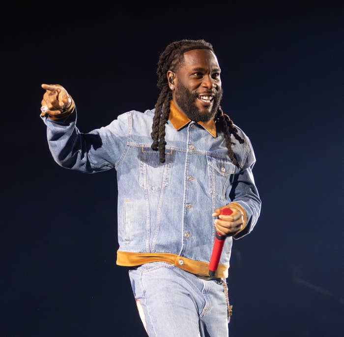 burna boy denim jacket performing live
