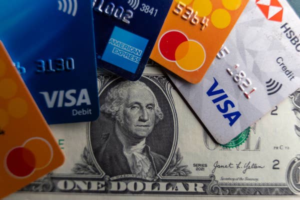 credit debit cards on us dollar bill.jpg