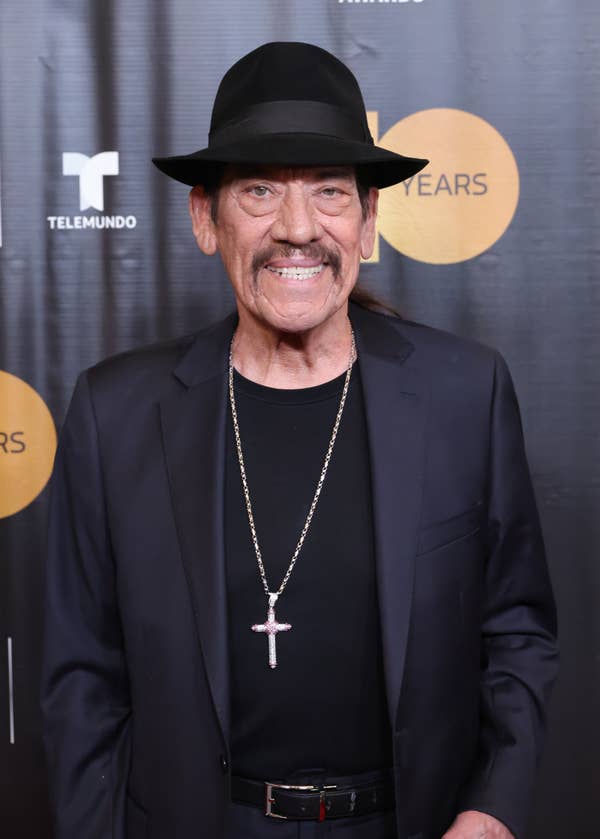danny trejo black suit fedora