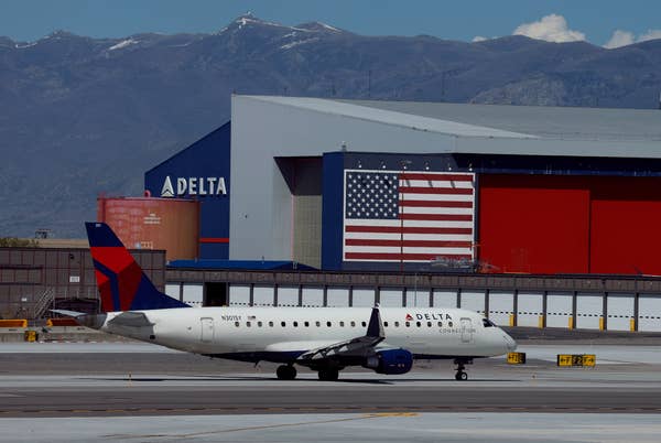 delta airlines airplane airport hangar.jpg