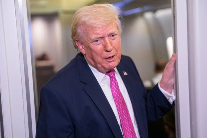 donald trump pink tie doorway