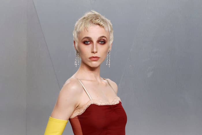 emma chamberlain blonde pixie cut red dress