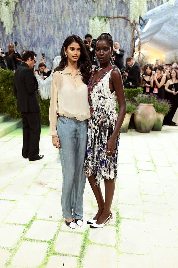 full length shot models met gala garden theme
