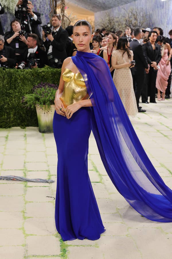 hailey bieber blue chiffon dress gold breastplate