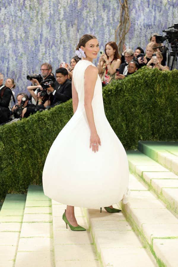 karlie kloss white pleated gown back view