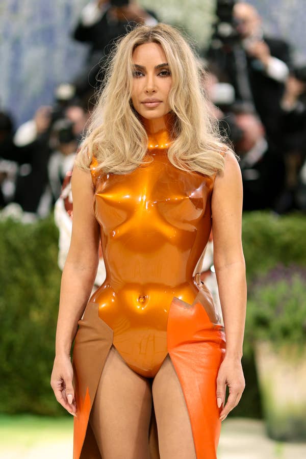 kim kardashian orange latex corset dress close up
