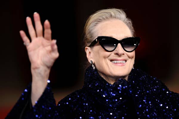 meryl streep waving black sequin coat sunglasses.jpg