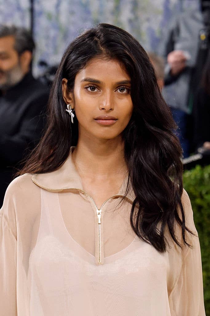 met gala model portrait beige blouse