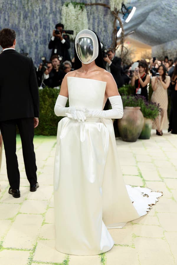 met gala white avant garde gown chrome mask