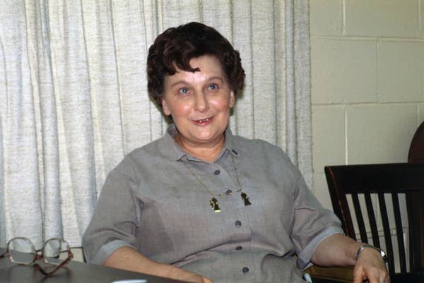 middle aged woman smiling indoors