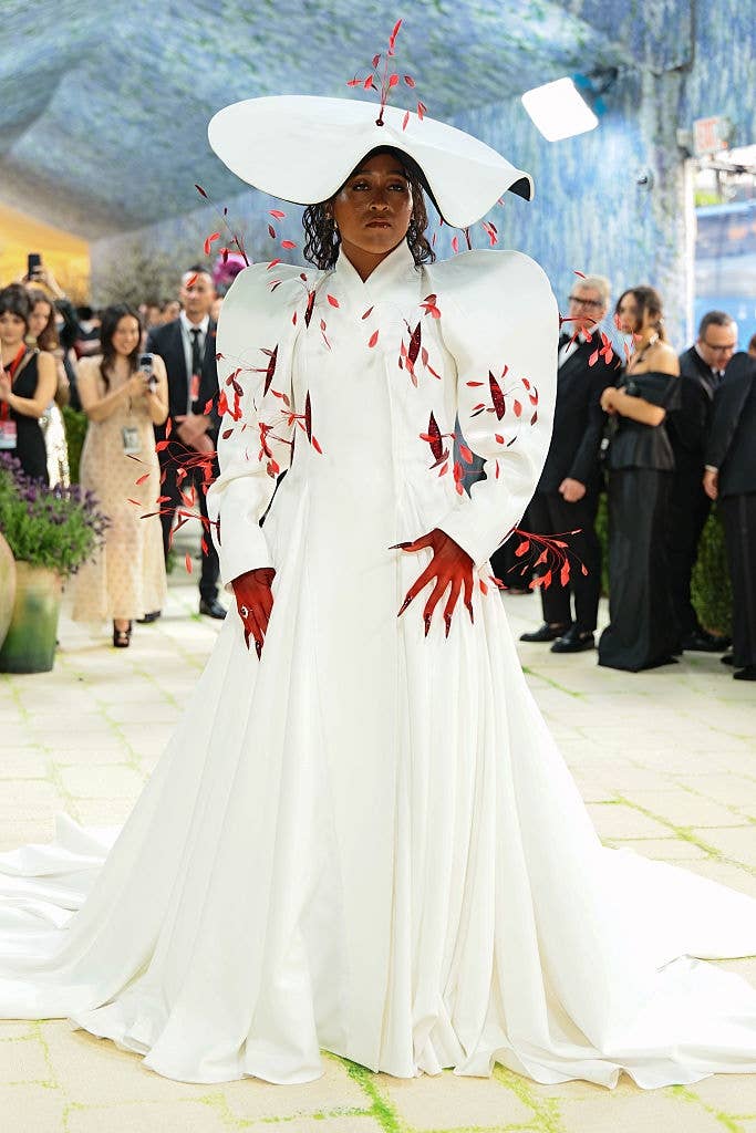 naomi osaka white structured gown red accents