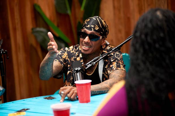 nick cannon podcast durag sunglasses speaking.jpg