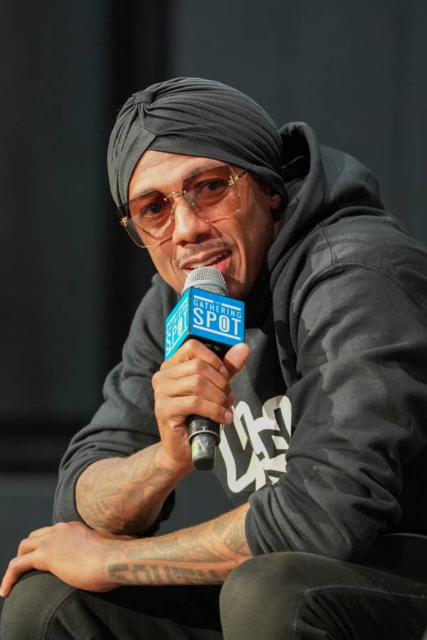 nick cannon turban speaking microphone.jpg