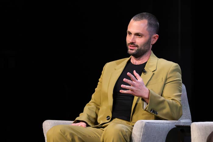 penn badgley buzz cut mustard suit