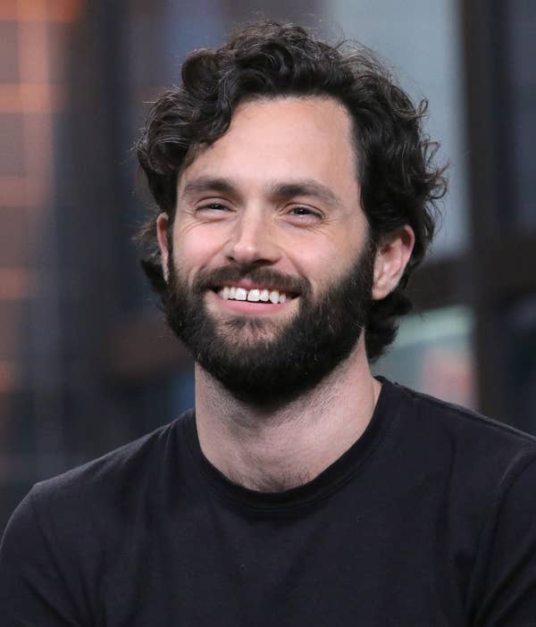 penn badgley smiling beard portrait