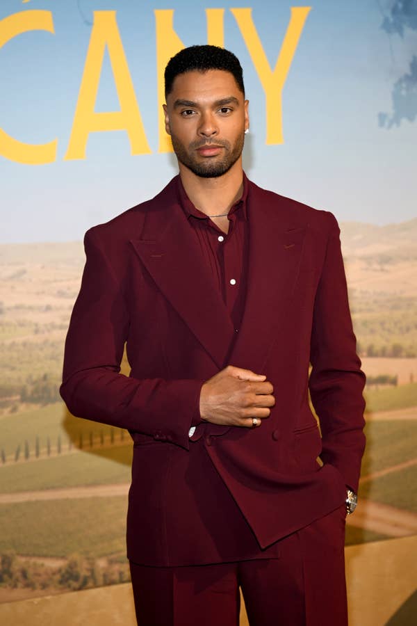 rege jean page burgundy suit premiere