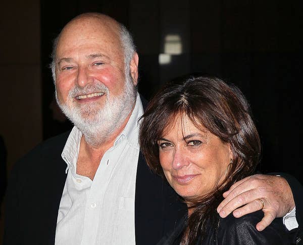 rob reiner smiling with woman on red carpet