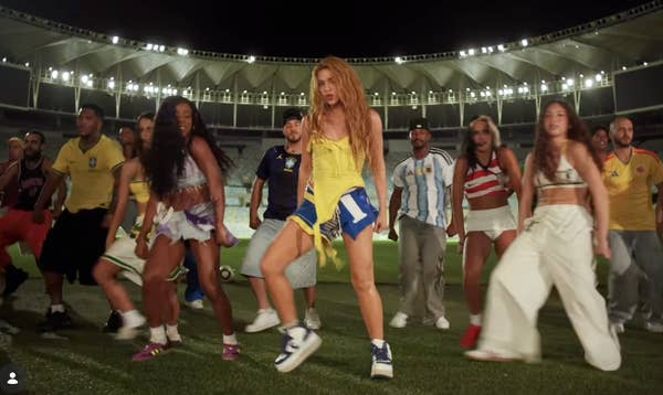 shakira dancing with group football field