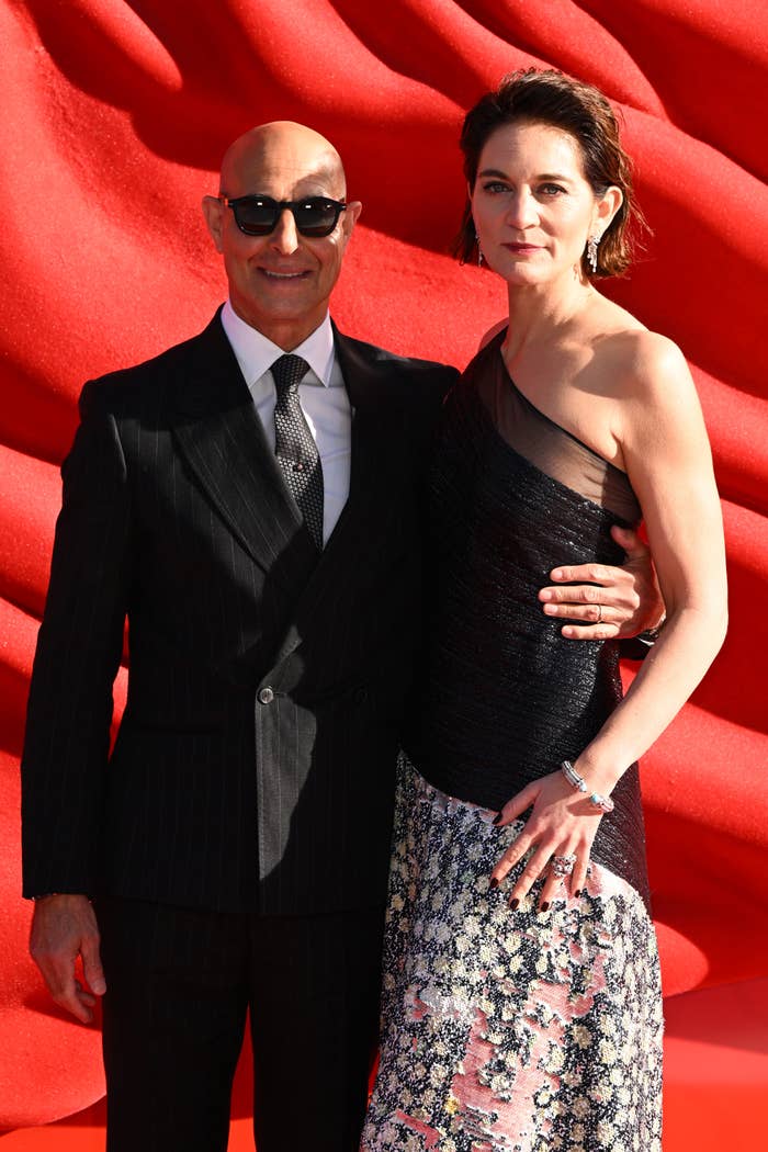 stanley tucci pinstripe suit felicity blunt floral gown
