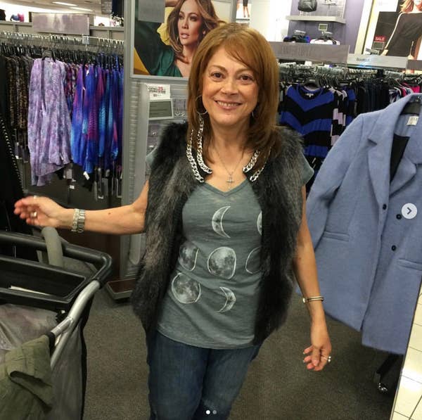 woman shopping clothing store fur vest